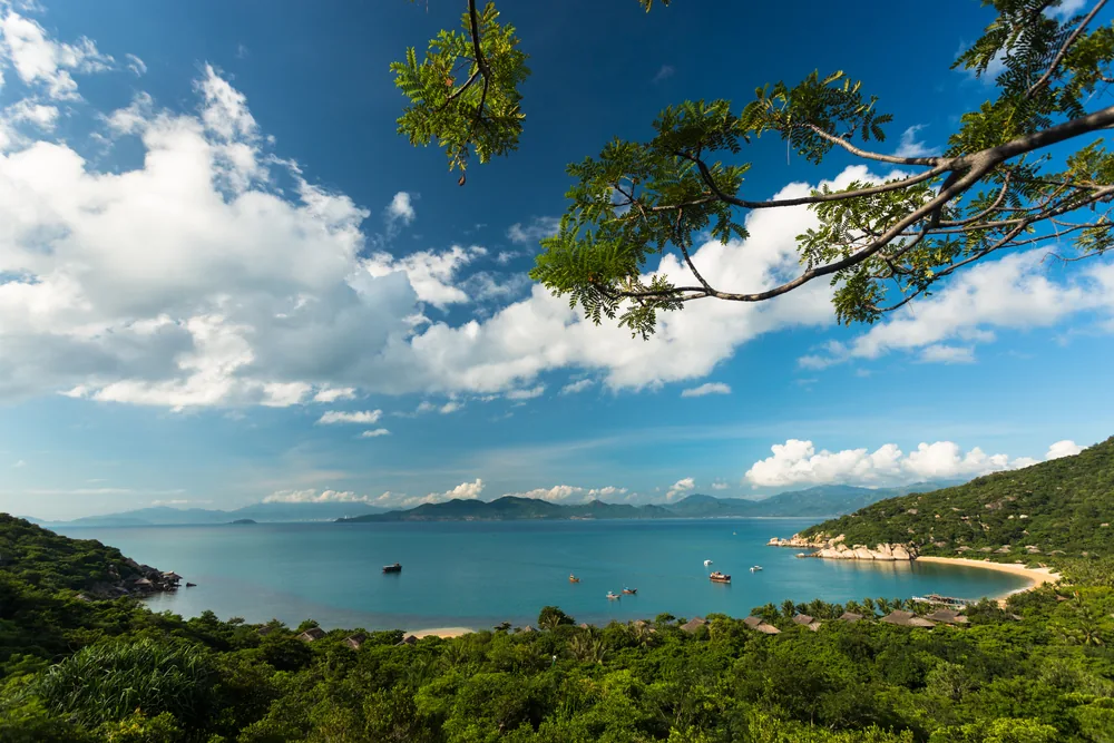 Aerial view of the beach and villas at Six Senses Ninh Van Bay
