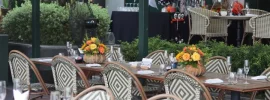 Halloween-decorated riverside terrace tables at Kitchen by the River, Mia Saigon