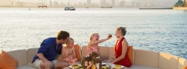 Family dining by the sea at Vinpearl Resort Nha Trang on Hon Tre Island