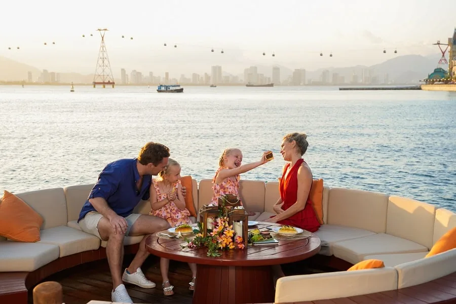 Family dining by the sea at Vinpearl Resort Nha Trang on Hon Tre Island